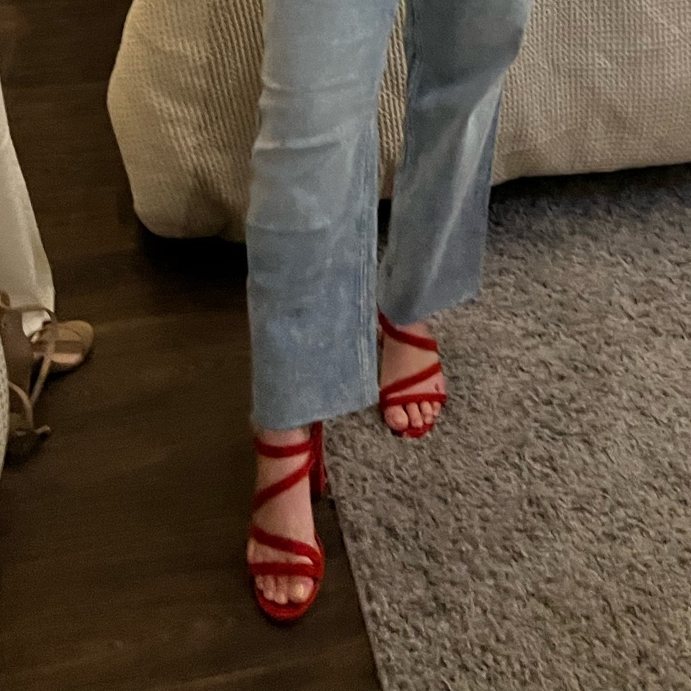 Red strappy high heels
